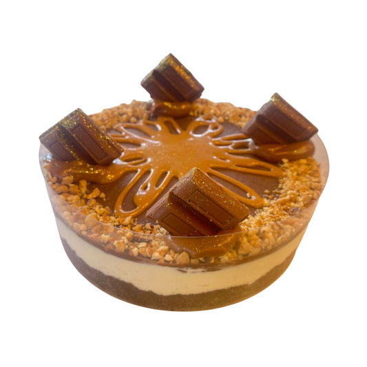 Torta de cheesecake snikers